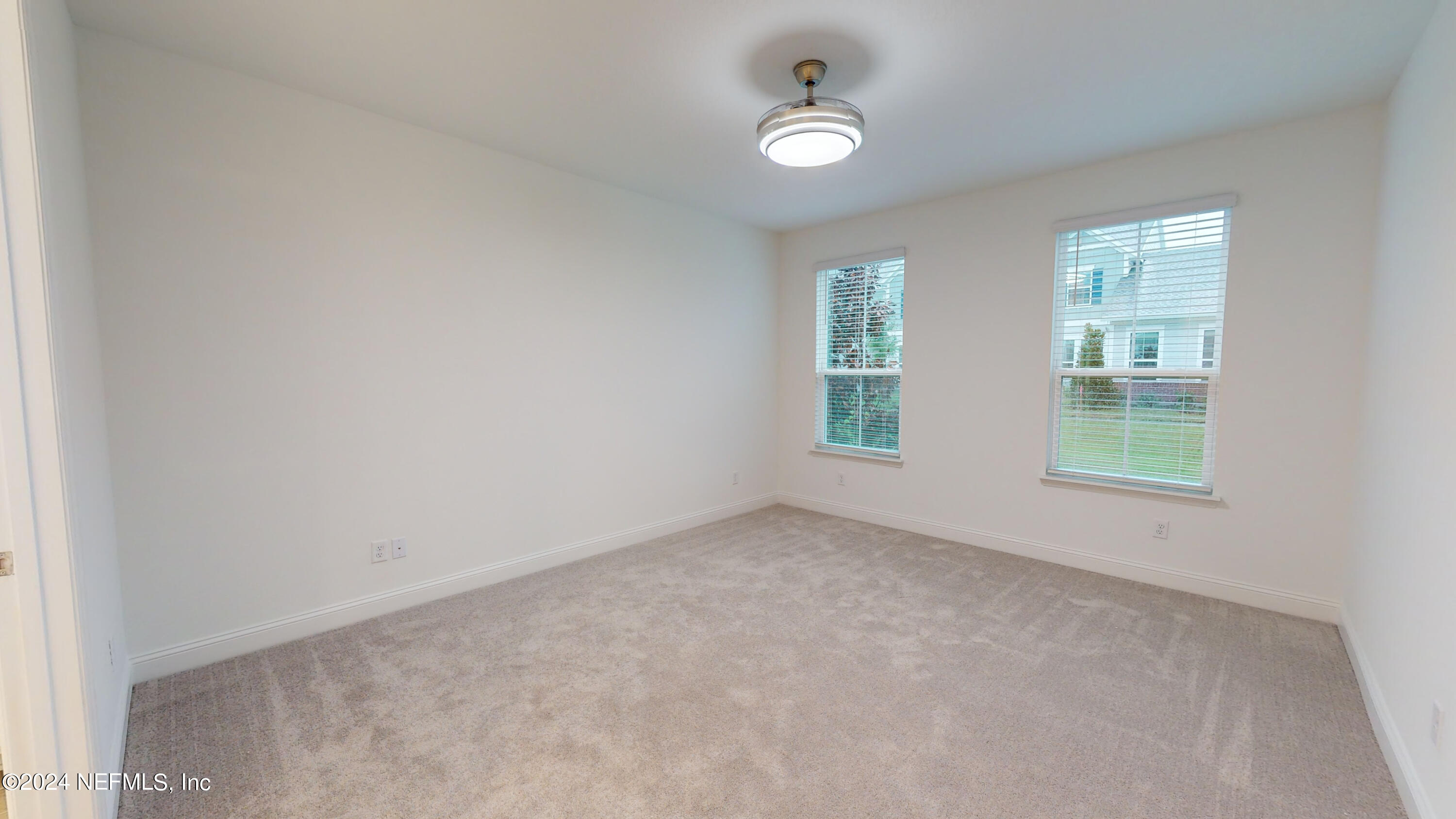 52 Tyson Ct Street St. Augustine, FL 32092 - Photo 8 of 31 an empty room with windows