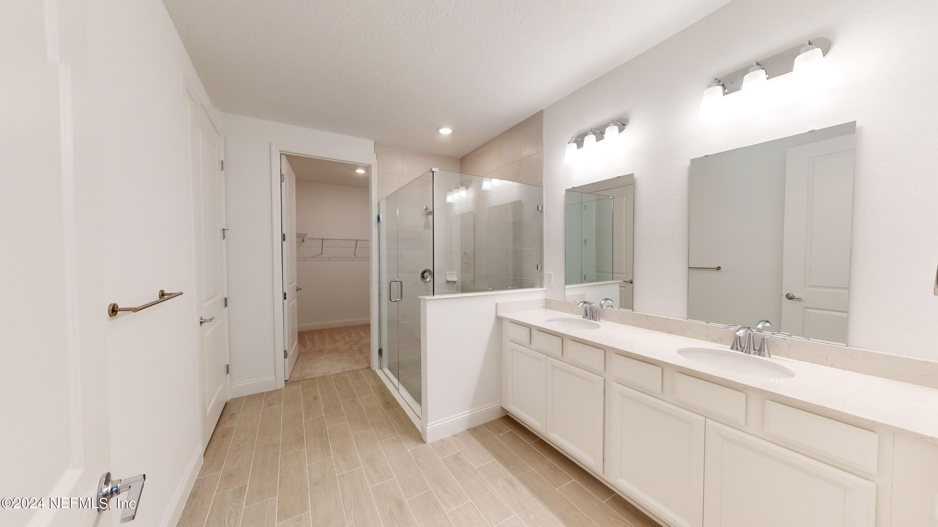 52 Tyson Ct Street St. Augustine, FL 32092 - Photo 10 of 31 a spacious bathroom with a double vanity sink mirror and double