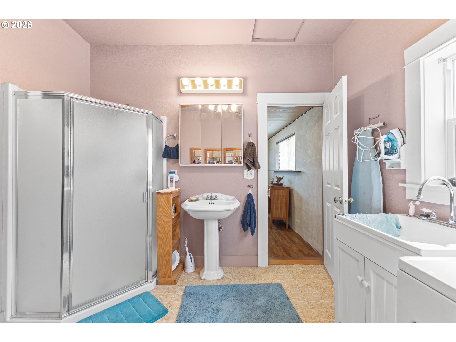 208 7th Street Myrtle Point, OR 97458 - Photo 33 of 48 a kitchen with a refrigerator and a sink