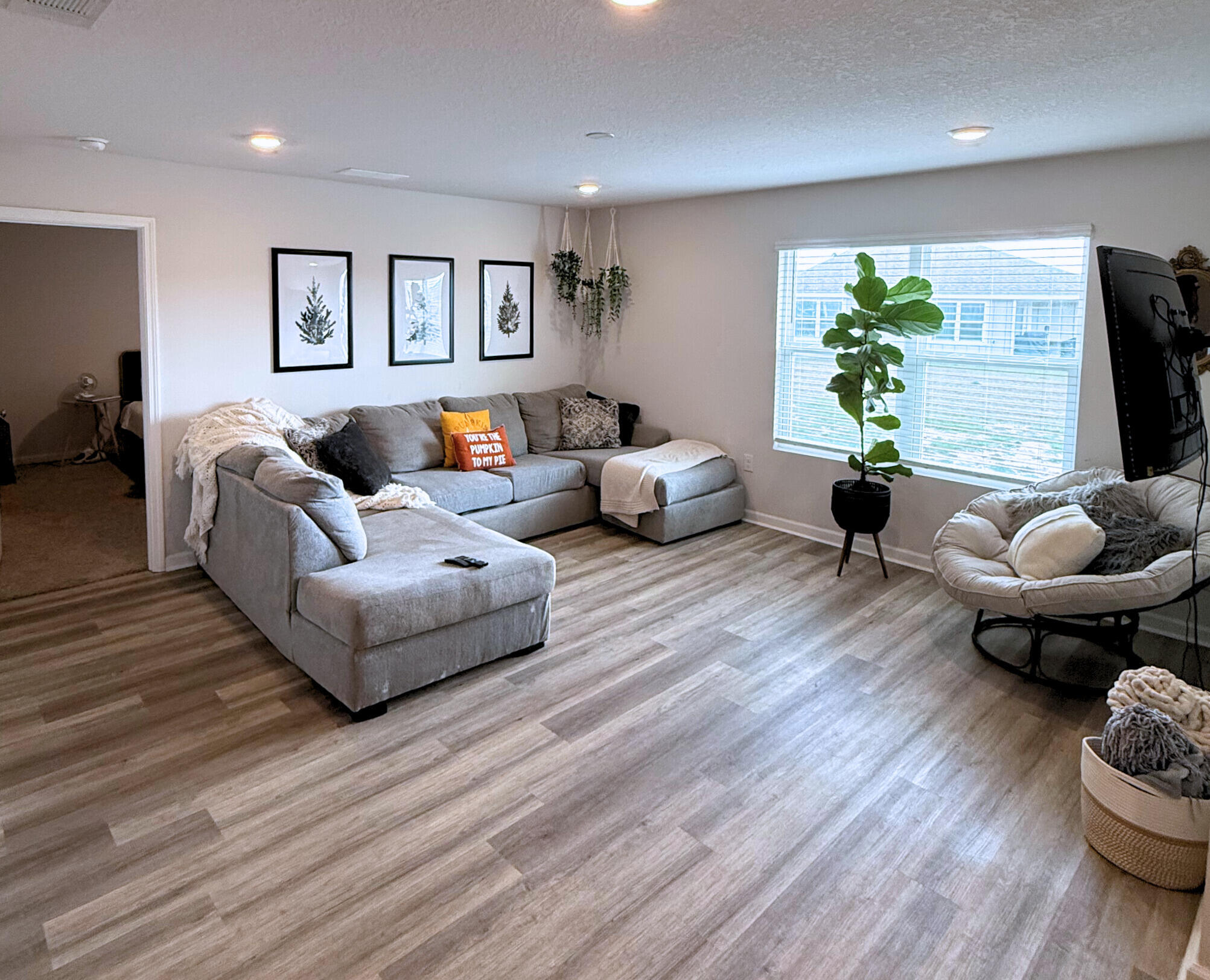 809 Otto Loop Crestview, FL 32539 - Photo 11 of 26 a living room with furniture and a wooden floor