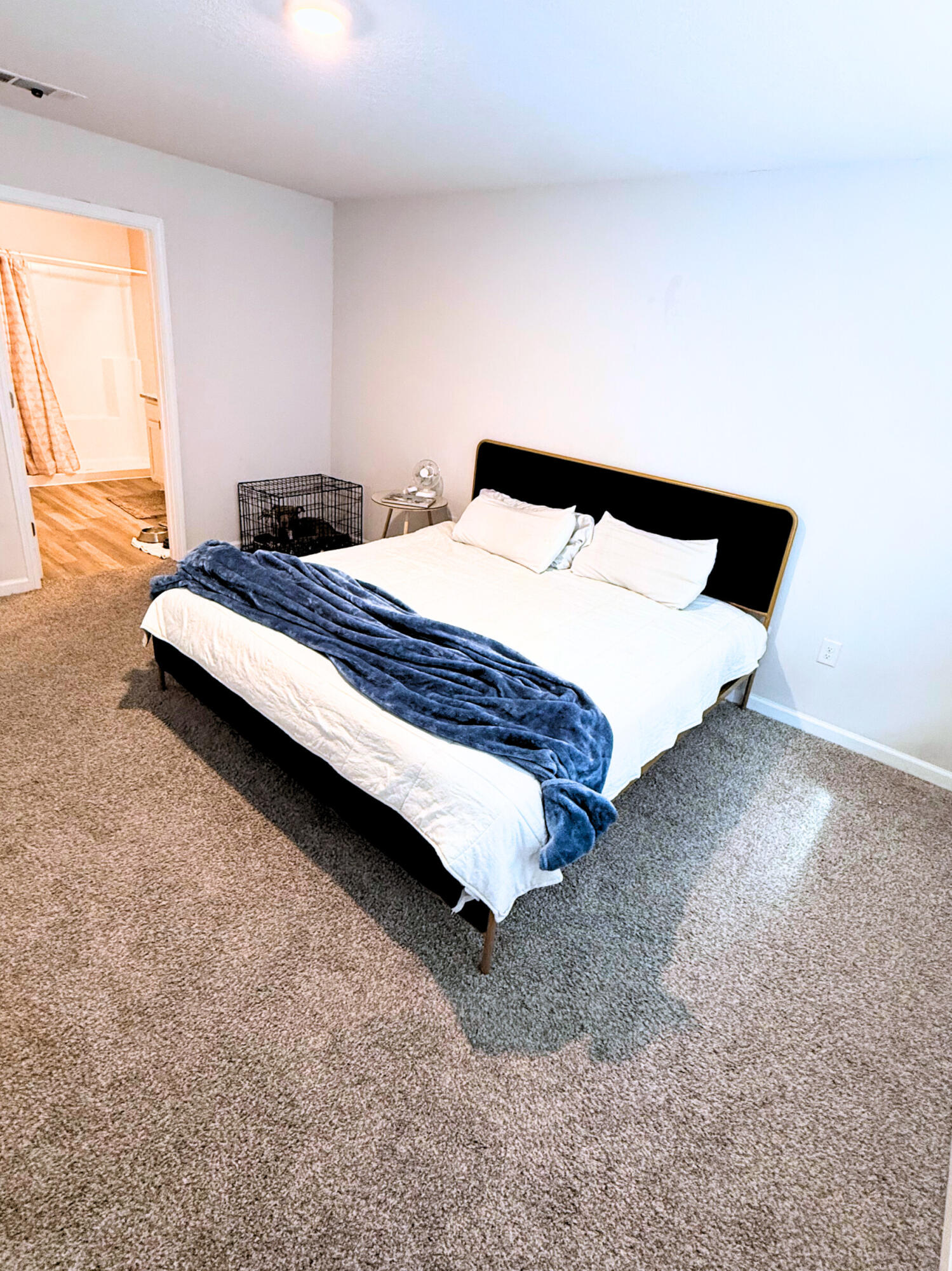 809 Otto Loop Crestview, FL 32539 - Photo 20 of 26 a bed sitting in a bedroom next to a window