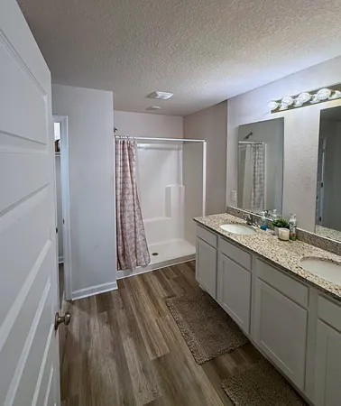 a bathroom with a toilet and a sink