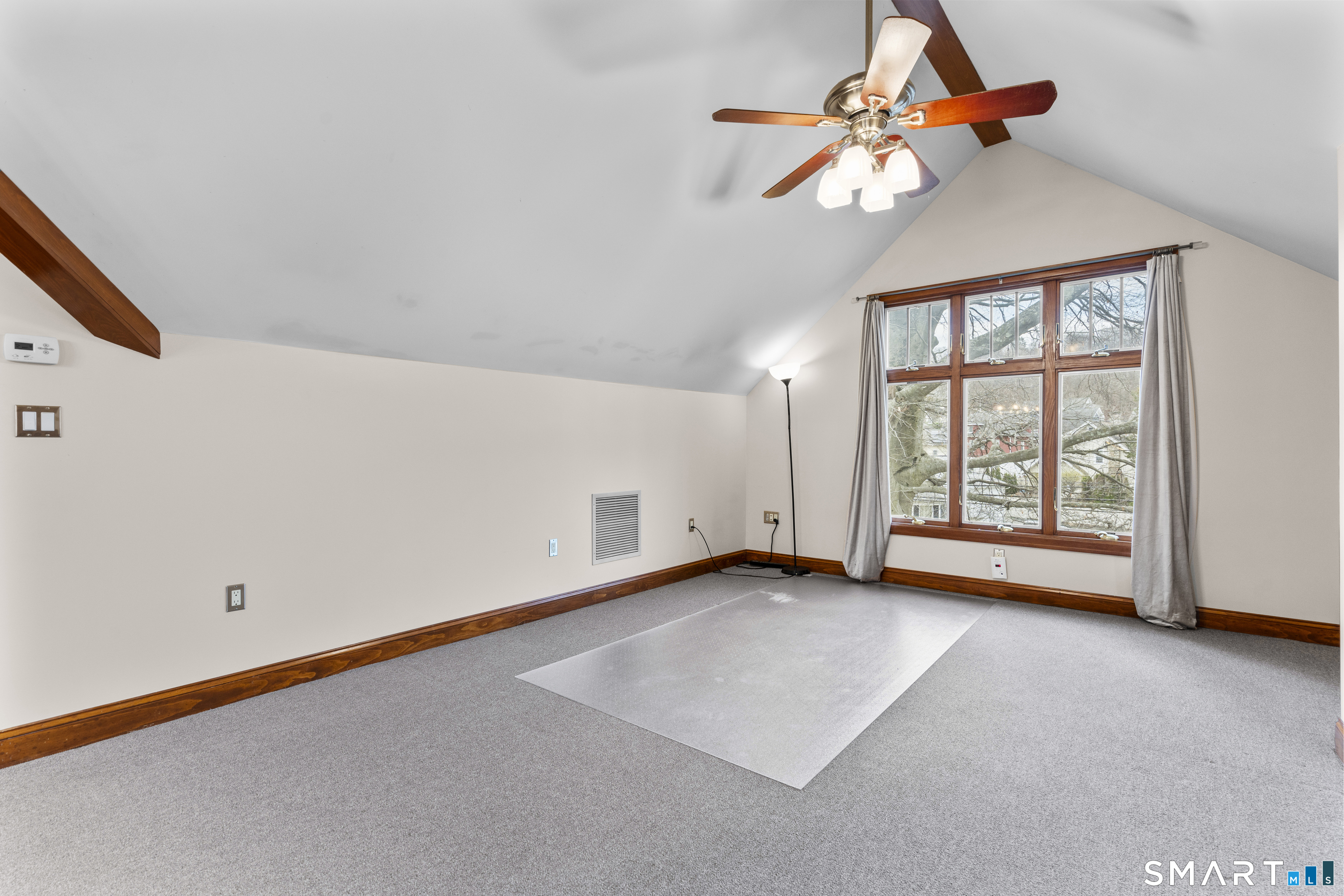 105 Howe Avenue Shelton, CT 06484 - Photo 13 of 38 a view of an empty room with a window