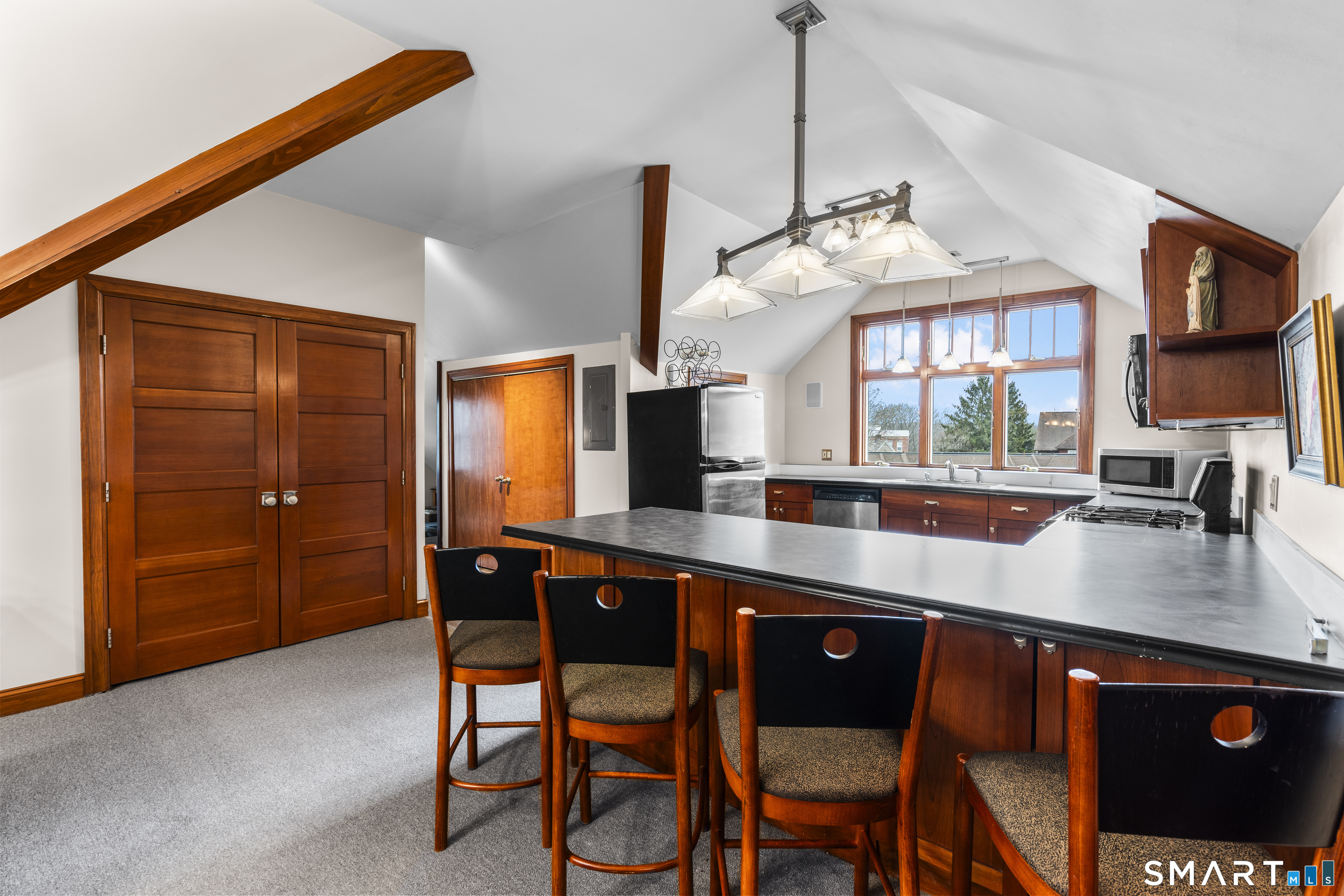 105 Howe Avenue Shelton, CT 06484 - Photo 24 of 38 a kitchen with a sink cabinets and window