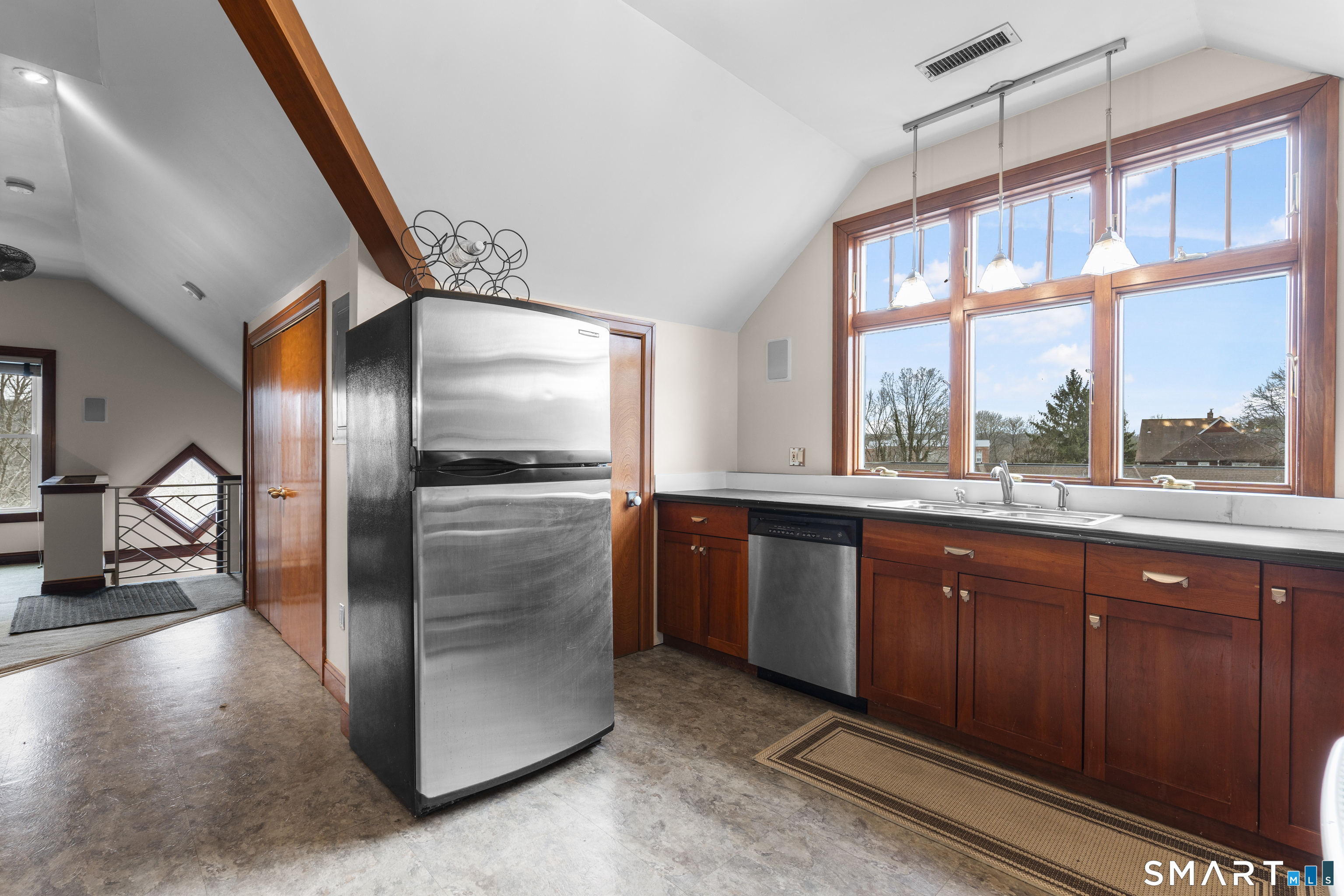 105 Howe Avenue Shelton, CT 06484 - Photo 28 of 38 a kitchen with stainless steel appliances granite countertop a refrigerator and a sink