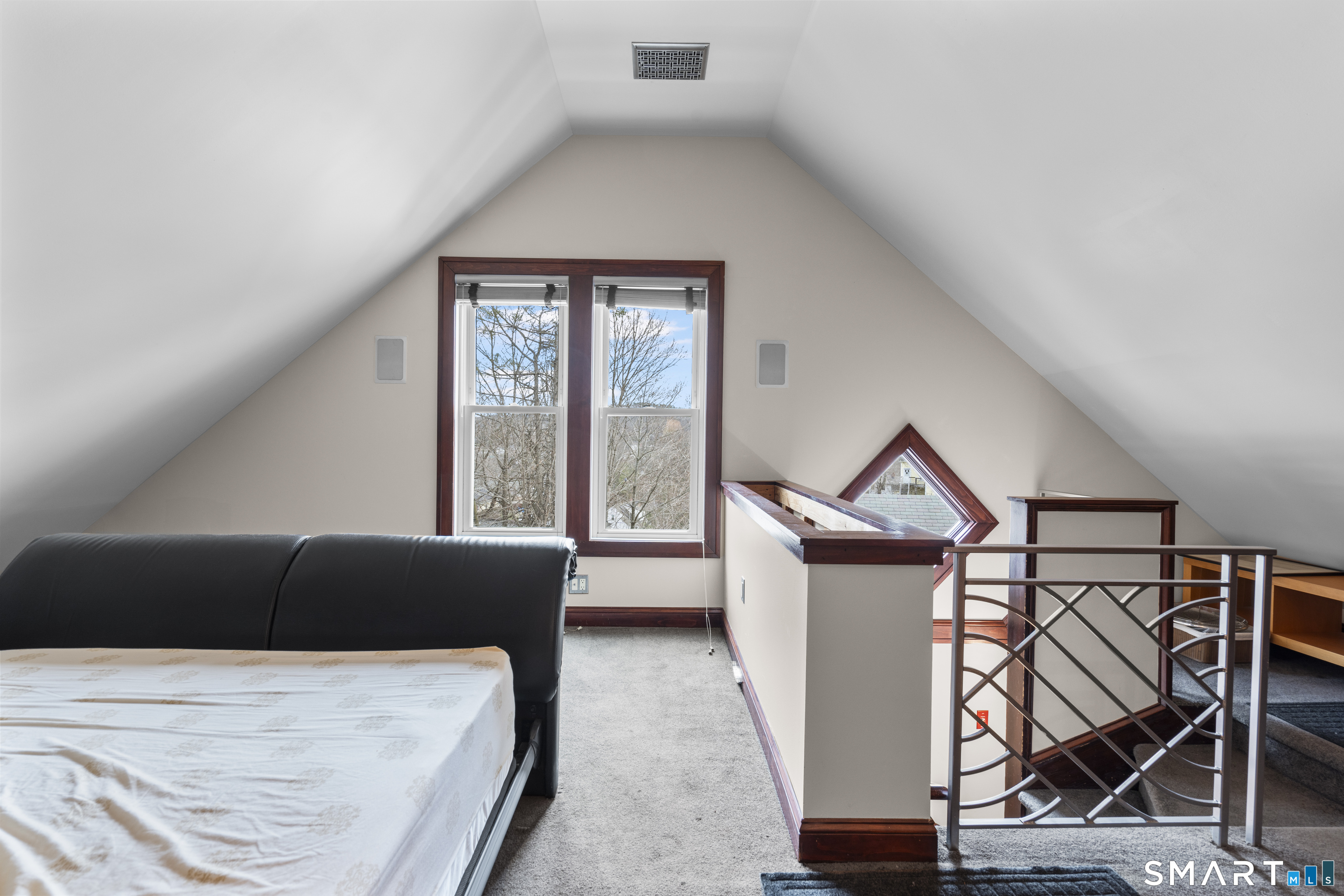 105 Howe Avenue Shelton, CT 06484 - Photo 30 of 38 a bedroom with furniture and a window