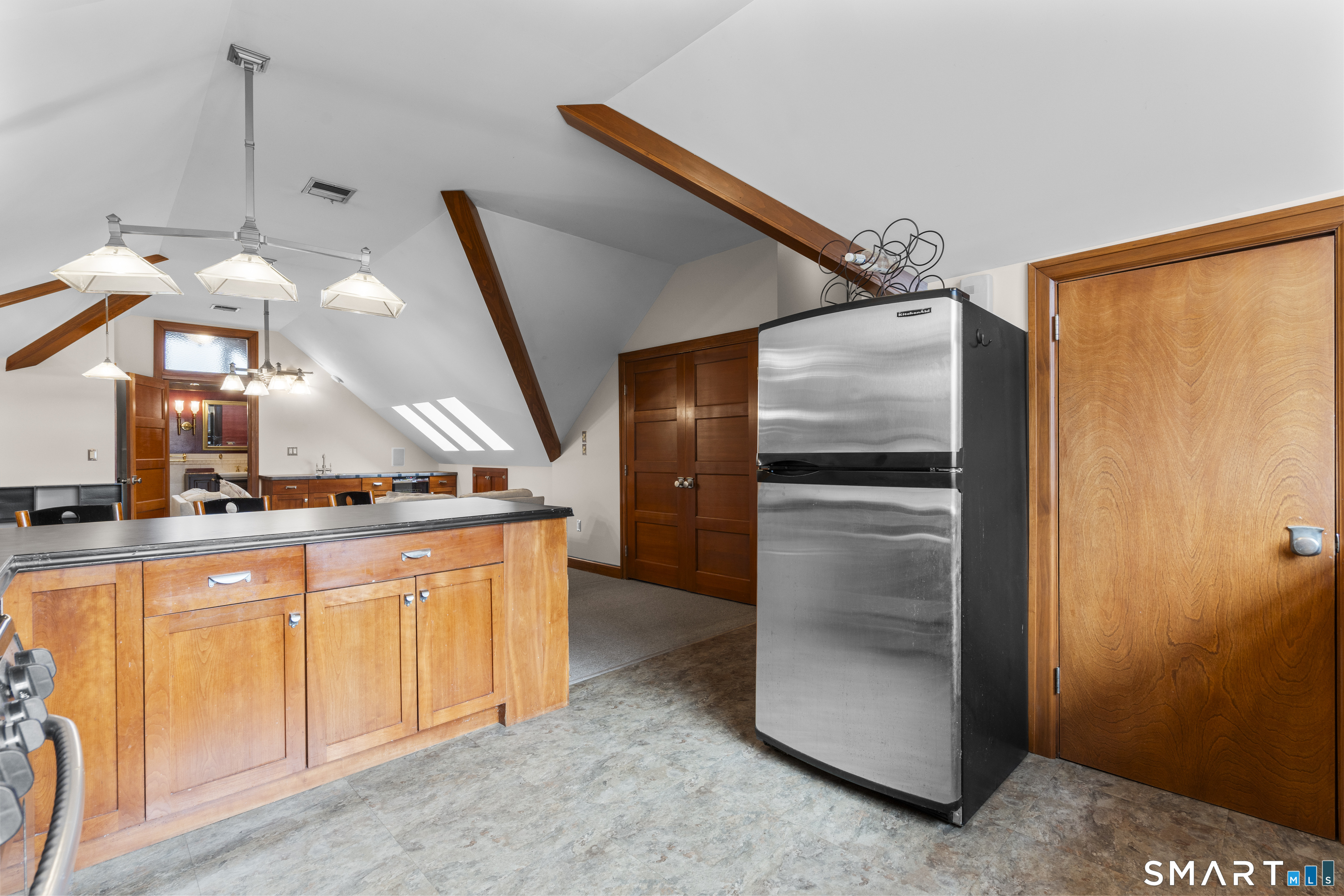 105 Howe Avenue Shelton, CT 06484 - Photo 34 of 38 a kitchen with stainless steel appliances granite countertop a refrigerator and a sink
