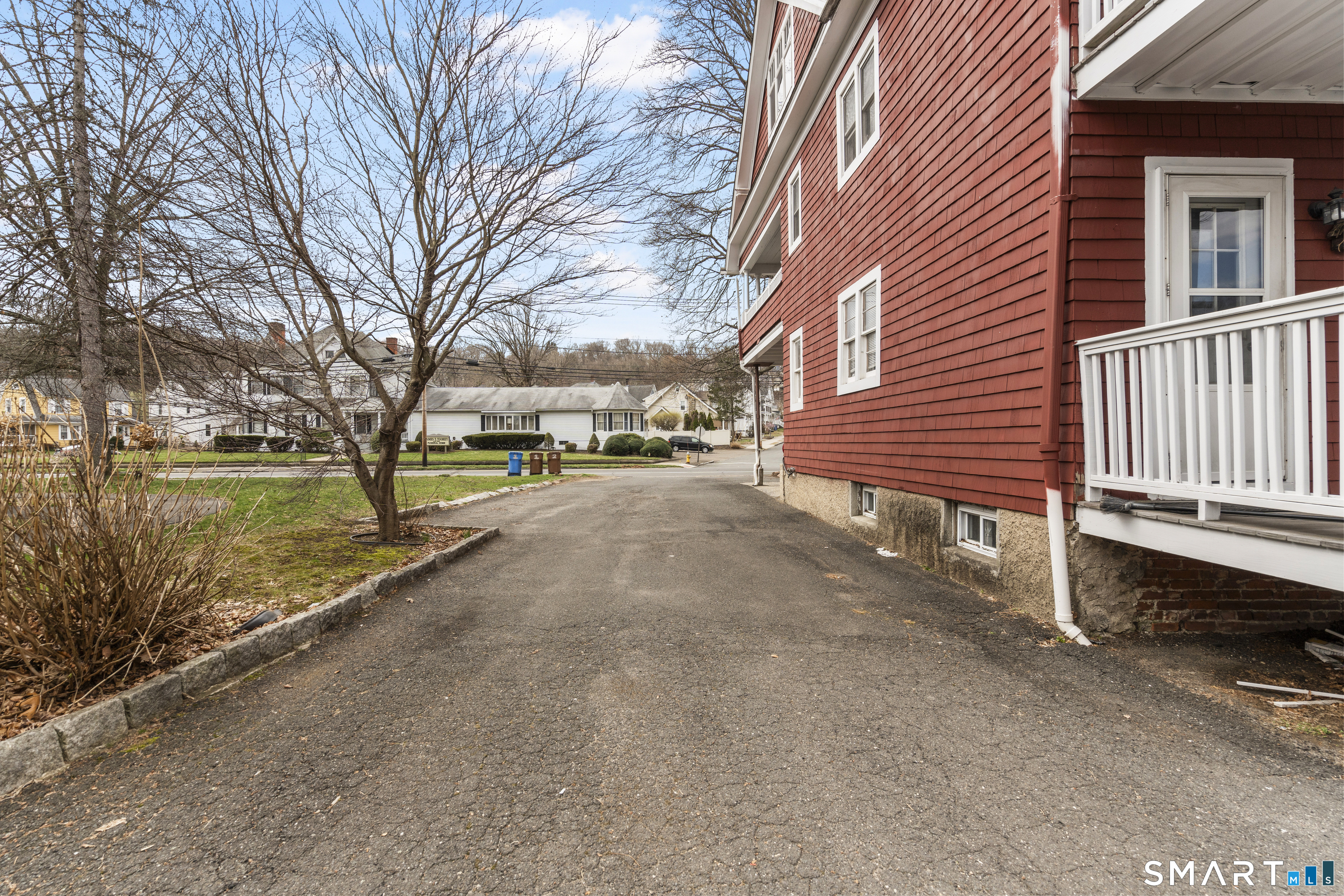 105 Howe Avenue Shelton, CT 06484 - Photo 6 of 38 a view of a house with a yard