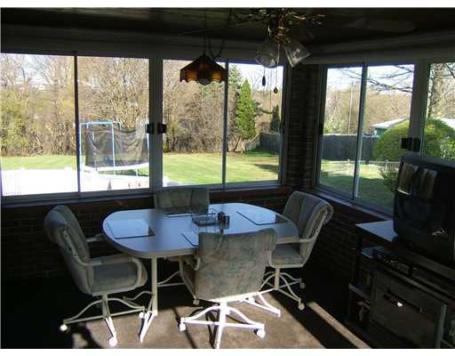 3831 Greenfield Road Allison Park, PA 15101 - Photo 15 of 18 Sunroom. The Light Filled Sunroom Overlooks the Back Yard. It has a Ceiling Fan, New Carpet & is Located Right Off the Kitchen.