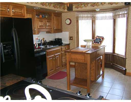 3831 Greenfield Road Allison Park, PA 15101 - Photo 5 of 18 Kitchen. The Kitchen Boasts a New Ceramic Floor, Bay Window & Beautiful Island. The Bay Window Allows for an Abundance of Natural Light.