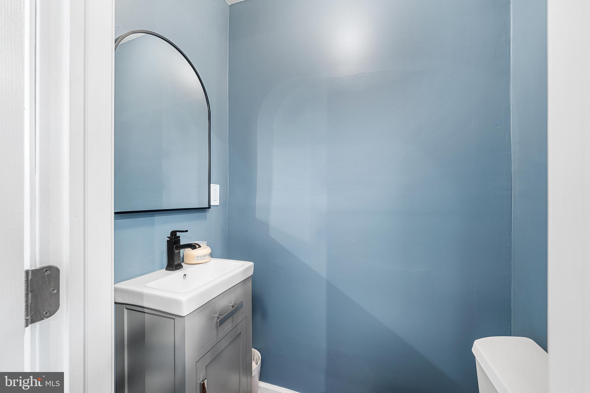2014 Pemberton Street Philadelphia, PA 19146 - Photo 13 of 24 a bathroom with a sink and a mirror