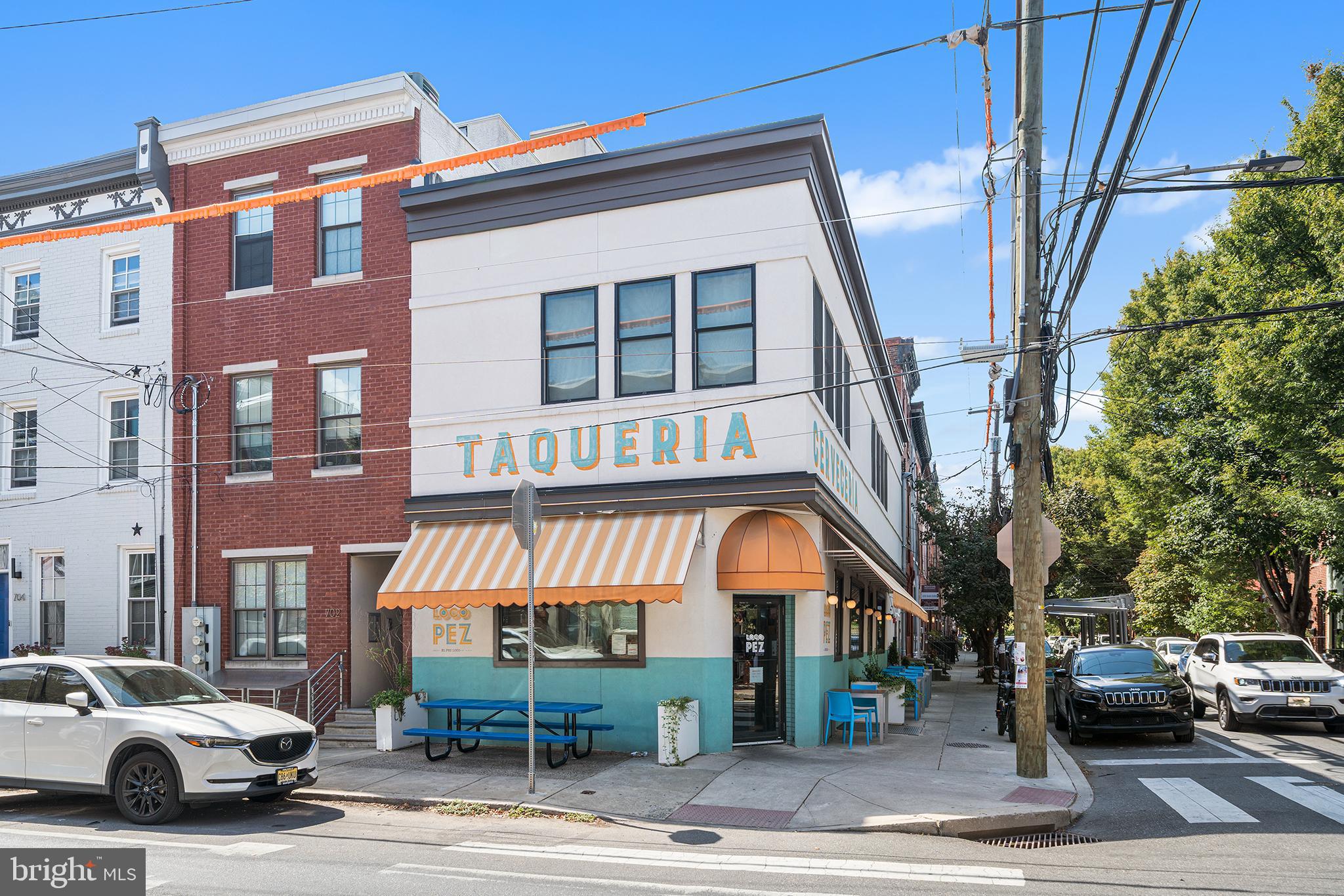 2014 Pemberton Street Philadelphia, PA 19146 - Photo 21 of 24 a view of a building and car parked on the side of road