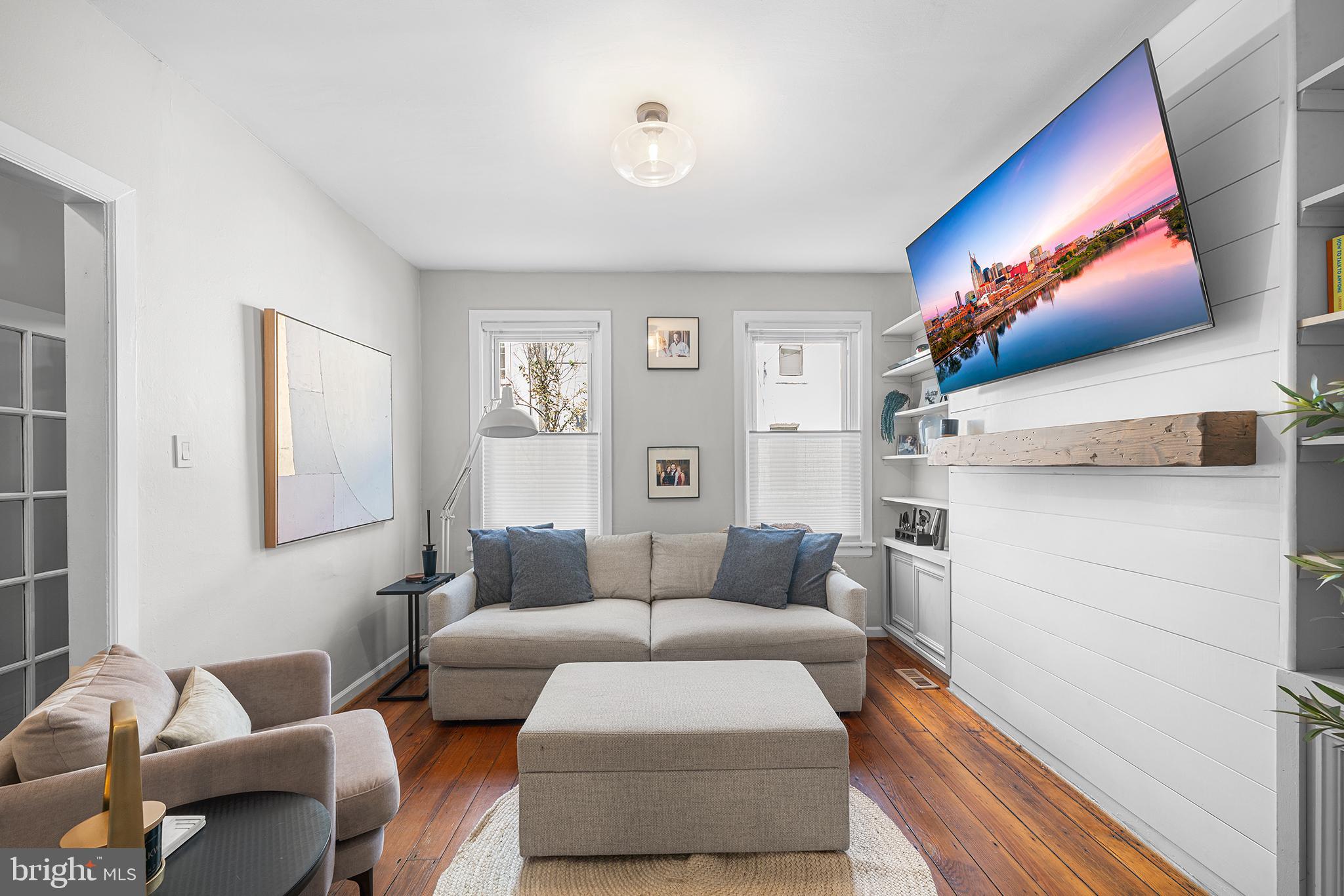 2014 Pemberton Street Philadelphia, PA 19146 - Photo 5 of 24 a living room with furniture and a flat screen tv
