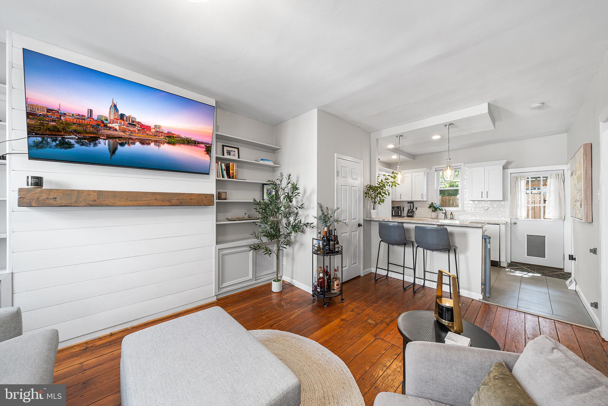 2014 Pemberton Street Philadelphia, PA 19146 - Photo 7 of 24 a living room with furniture and a flat screen tv