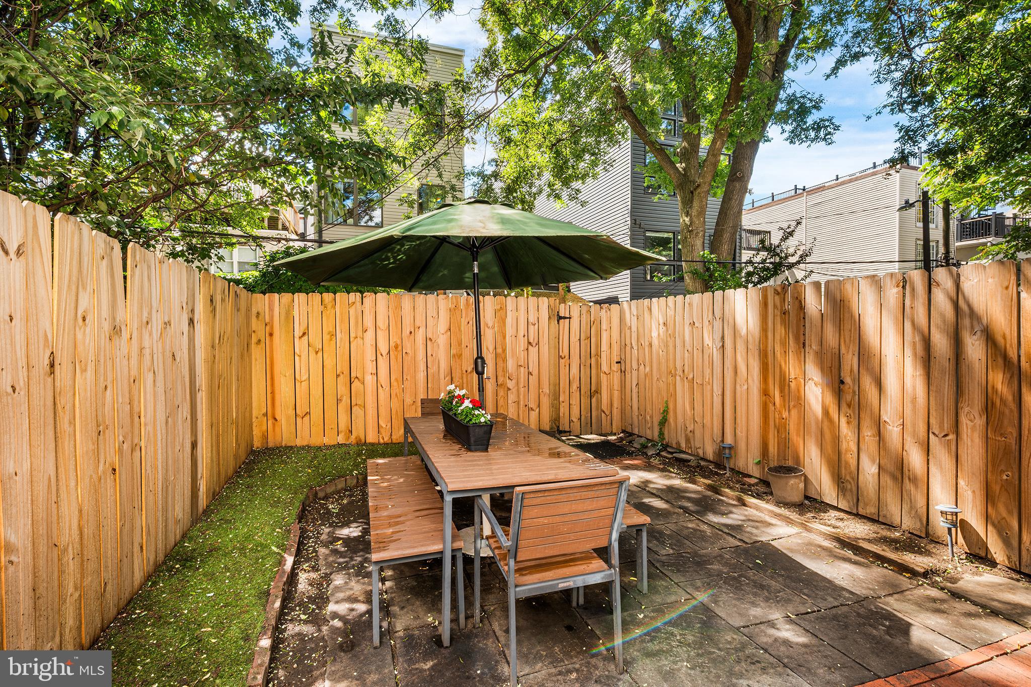 2014 Pemberton Street Philadelphia, PA 19146 - Photo 10 of 24 a backyard of a house with table and chairs