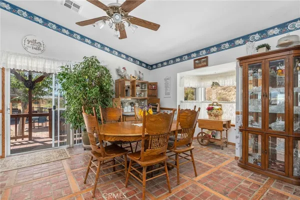 a kitchen view with granite countertop lots of counter top space and stainless steel appliances