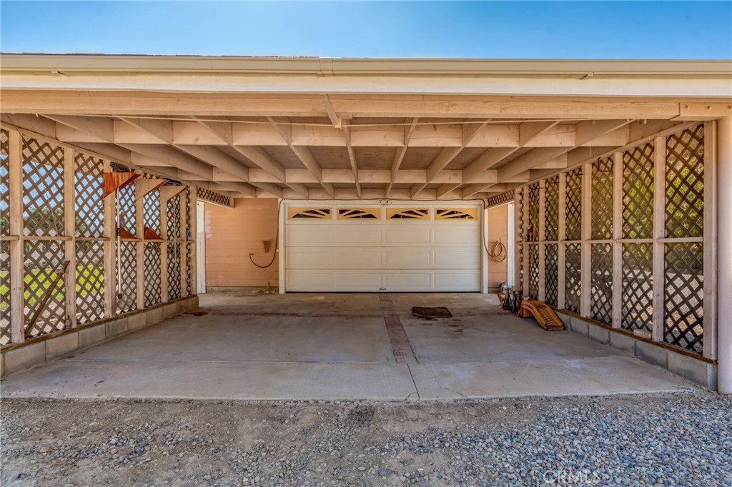 1087 Lockwood Valley Road Maricopa, CA 93252 - Photo 42 of 74 a view of a garage with wooden walls