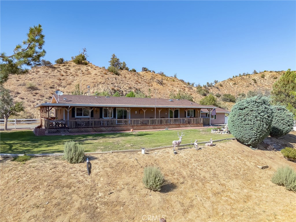 1087 Lockwood Valley Road Maricopa, CA 93252 - Photo 55 of 74 a view of a house with a big yard