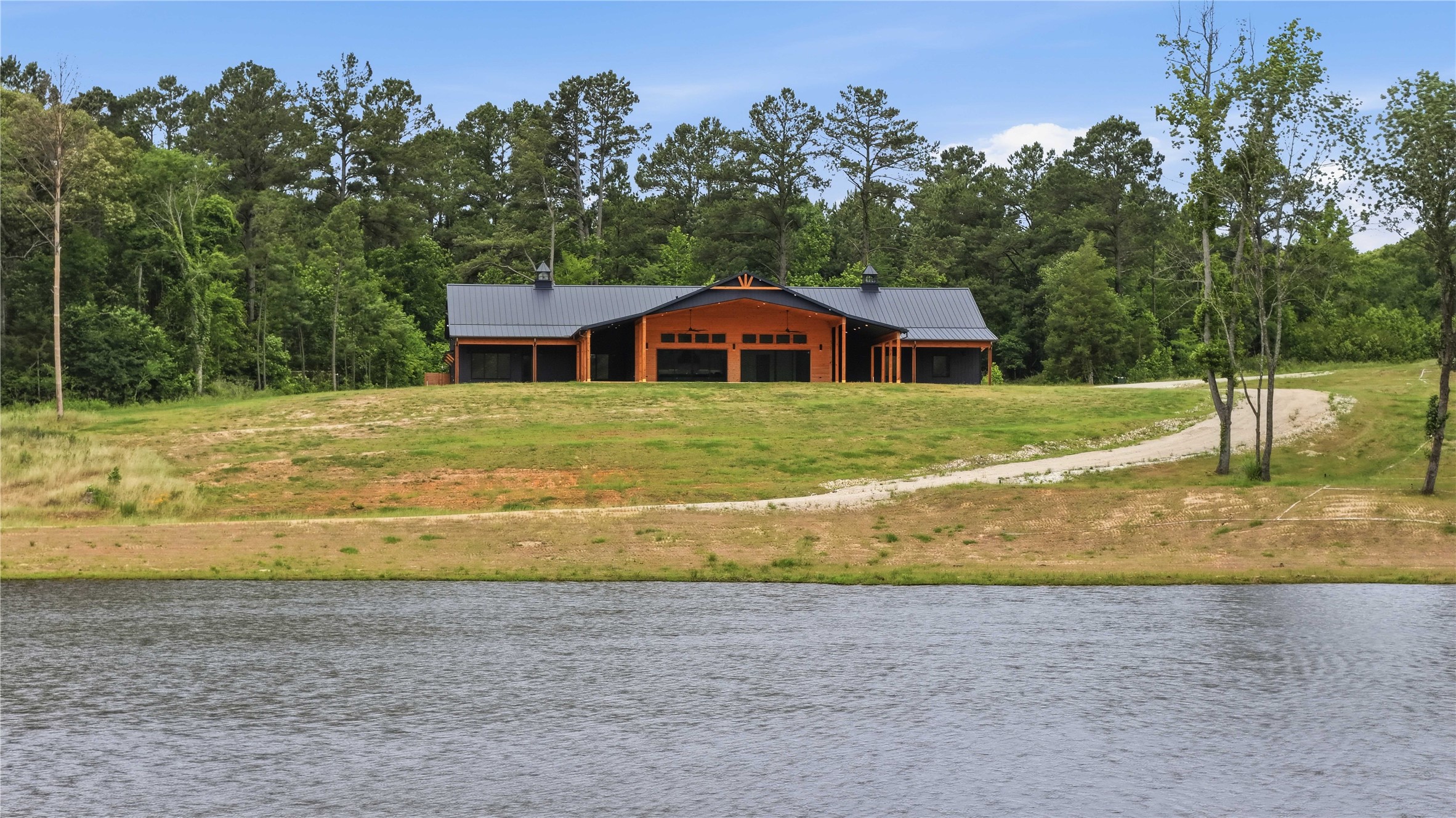 447 County Road 2211 Rusk, TX 75785 - Photo 18 of 50 a front view of a house with a yard
