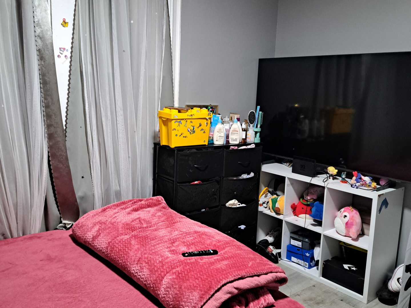 450 West 46th Place Chicago, IL 60609 - Photo 7 of 9 a bedroom with a bed and a flat tv screen on dresser