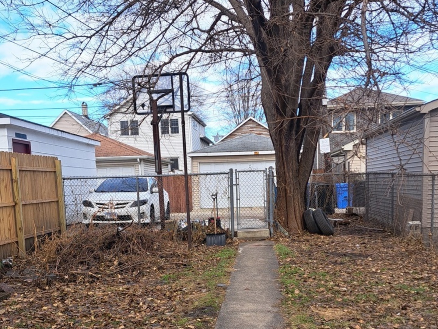 450 West 46th Place Chicago, IL 60609 - Photo 9 of 9 a view of a house with a tree in the yard