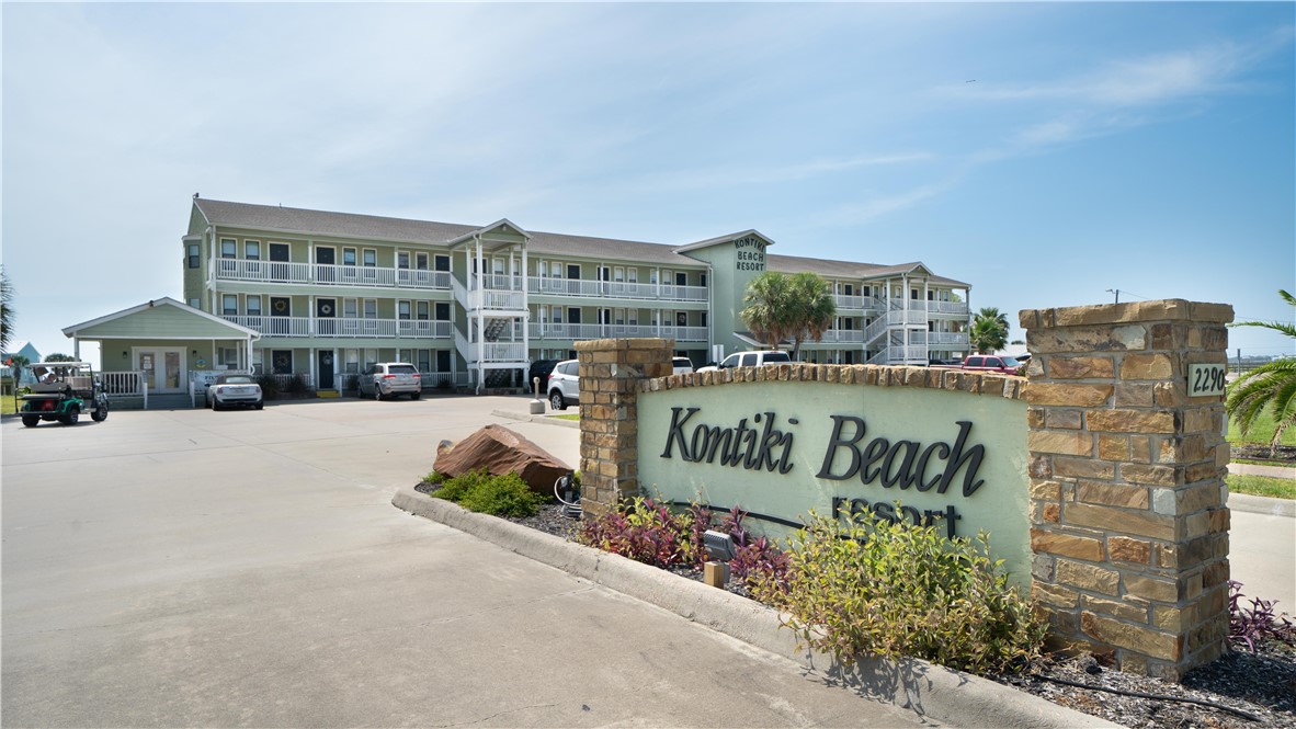 a view of building with sign board