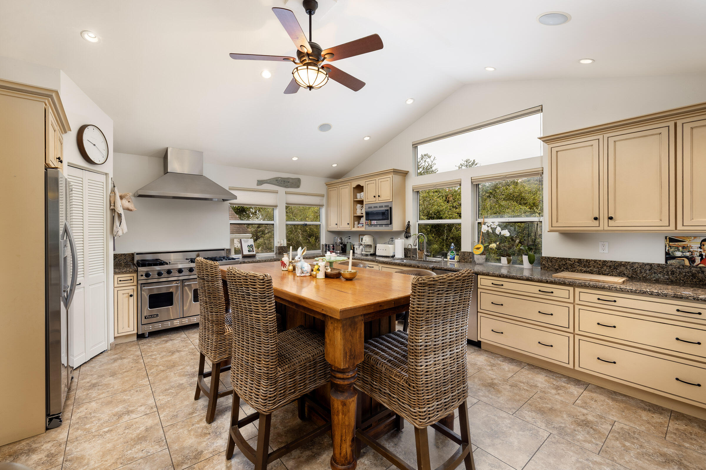 1352 Manitou Road Santa Barbara, CA 93101 - Photo 7 of 27 a kitchen with stainless steel appliances granite countertop a sink a stove and a refrigerator