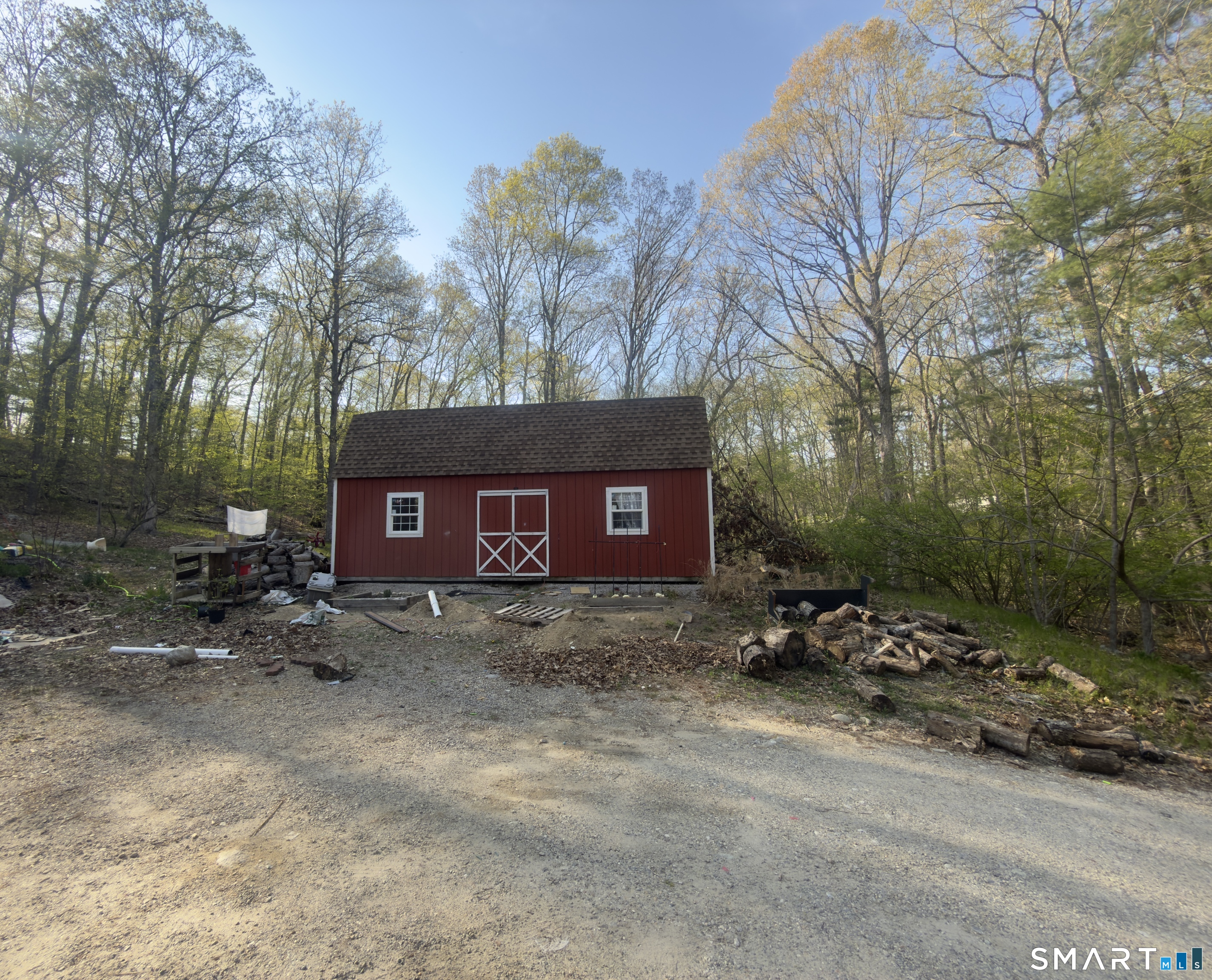 3 Fullertown Road Sprague, CT 06330 - Photo 2 of 2 a backyard of a house with table and chairs