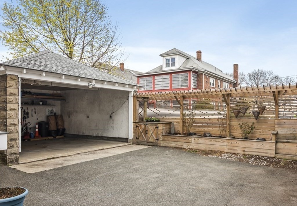 22 Wellington Road Medford, MA 02155 - Photo 15 of 16 a view of a house with a outdoor space
