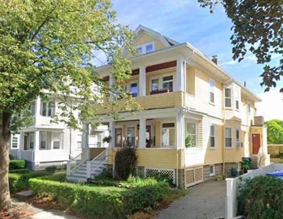 22 Wellington Road Medford, MA 02155 - Photo 16 of 16 a front view of a house with a yard