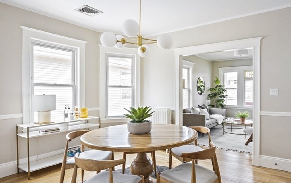 22 Wellington Road Medford, MA 02155 - Photo 5 of 16 a view of a dining room with furniture window and wooden floor
