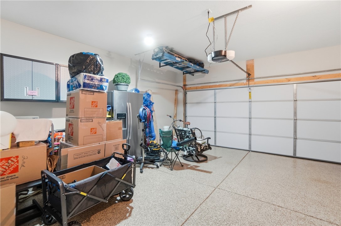 605 Cape Cod Court Beavercreek, OH 45430 - Photo 43 of 54 This spacious garage offers versatile storage options and convenient access.