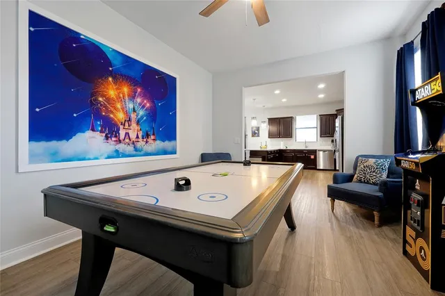 a view of kitchen furniture and wooden floor