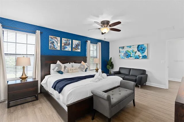 a bedroom with bed and a window