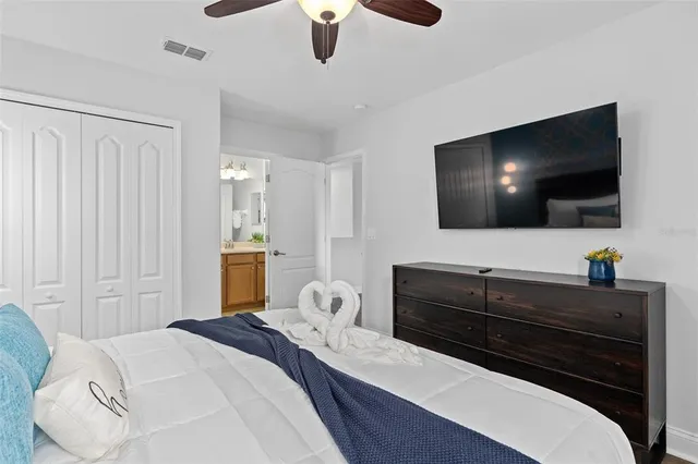 a bathroom with a toilet sink and shower