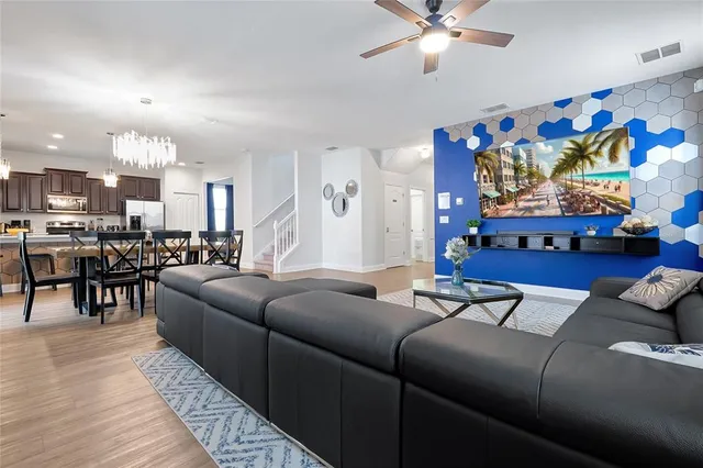 a living room with furniture and a couch