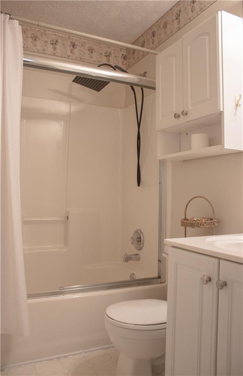 840 Camelon Court Alpharetta, GA 30004 - Photo 14 of 25 a bathroom with a shower a toilet and sink