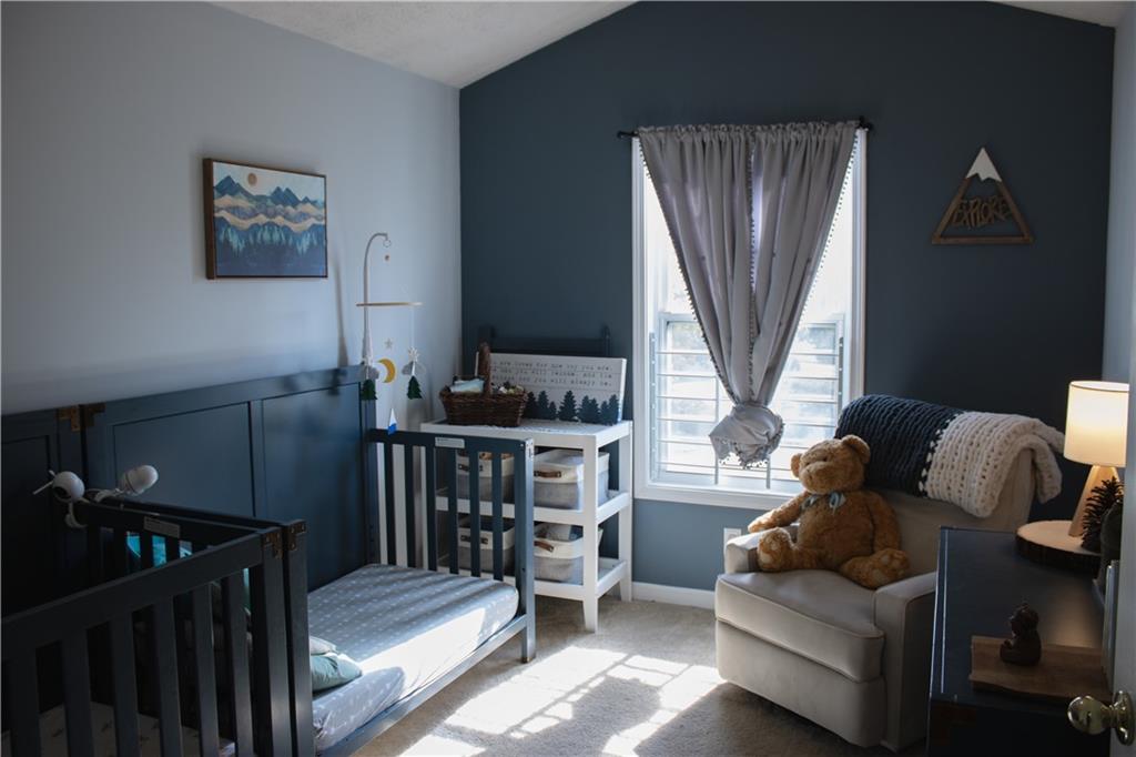 840 Camelon Court Alpharetta, GA 30004 - Photo 15 of 25 a living room with furniture and a window