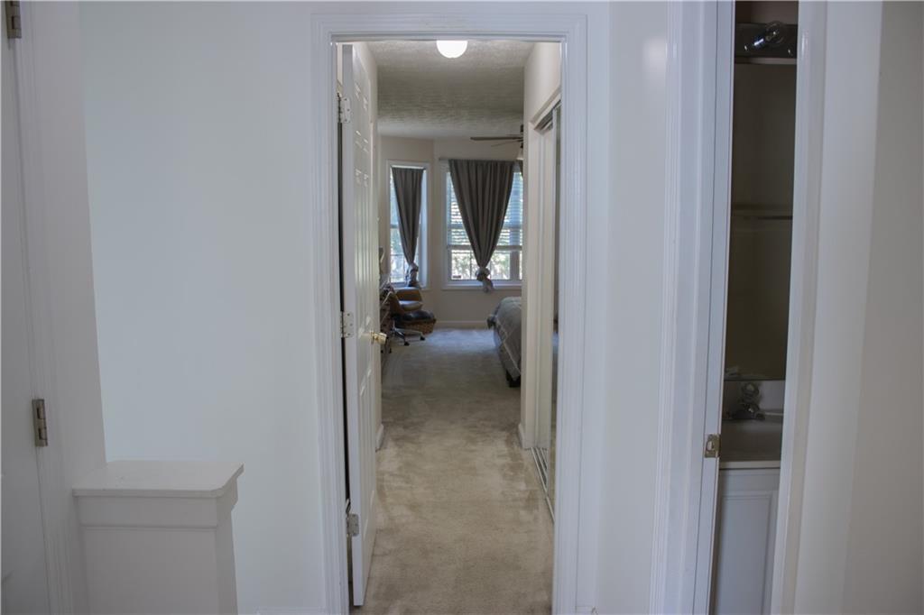 840 Camelon Court Alpharetta, GA 30004 - Photo 19 of 25 a view of a hallway with a view of a livingroom from a hallway