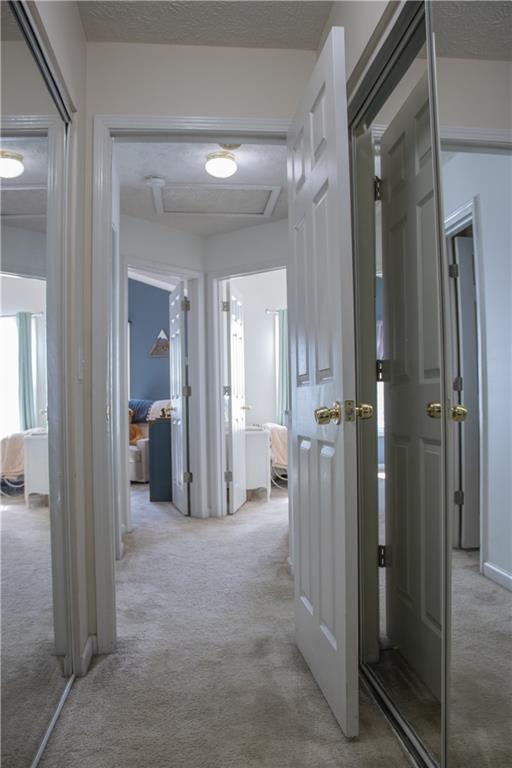 840 Camelon Court Alpharetta, GA 30004 - Photo 20 of 25 a view of a hallway with closet and bathroom