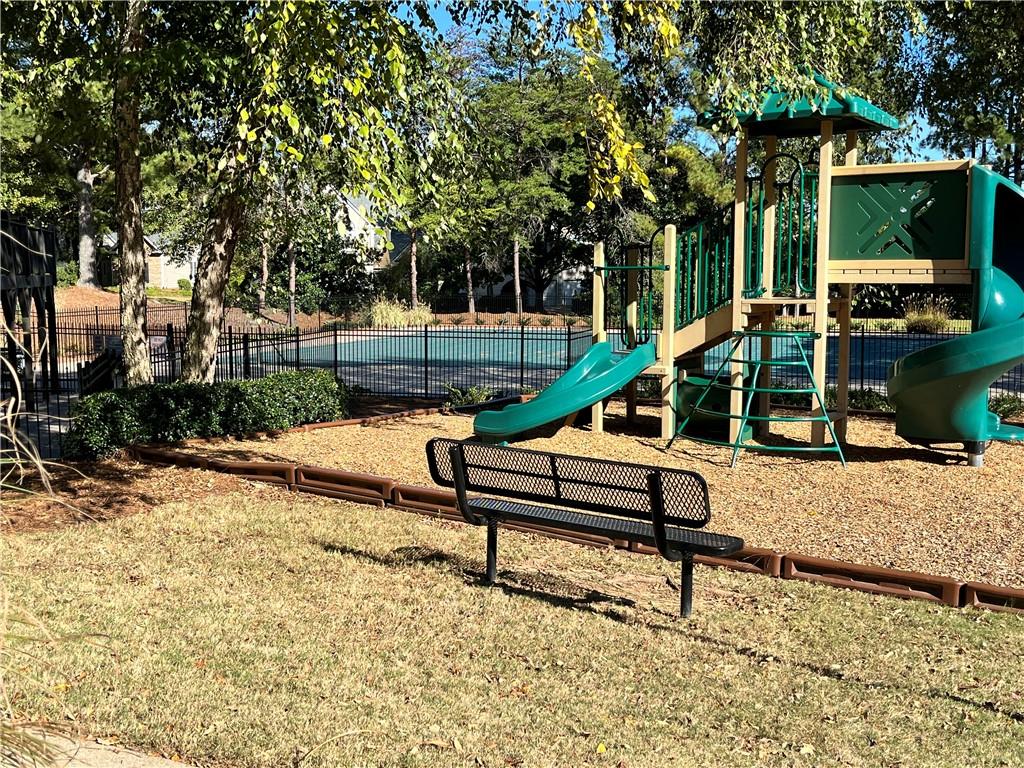 840 Camelon Court Alpharetta, GA 30004 - Photo 23 of 25 a park with wooden bench and trees