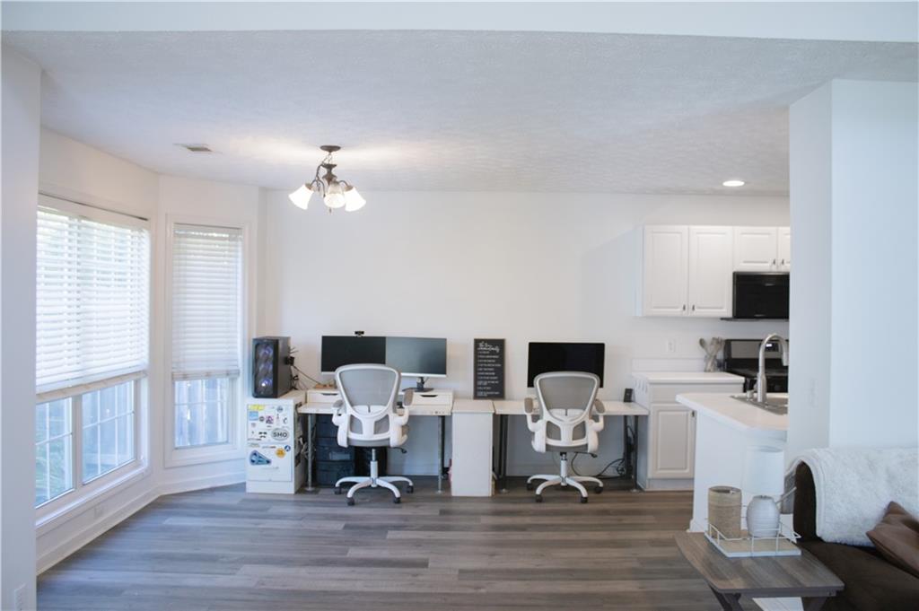 840 Camelon Court Alpharetta, GA 30004 - Photo 7 of 25 a living room with furniture