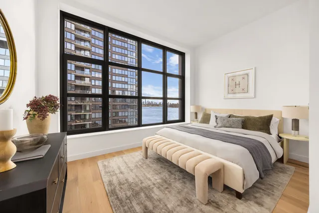 a kitchen with stainless steel appliances a sink a stove and a refrigerator