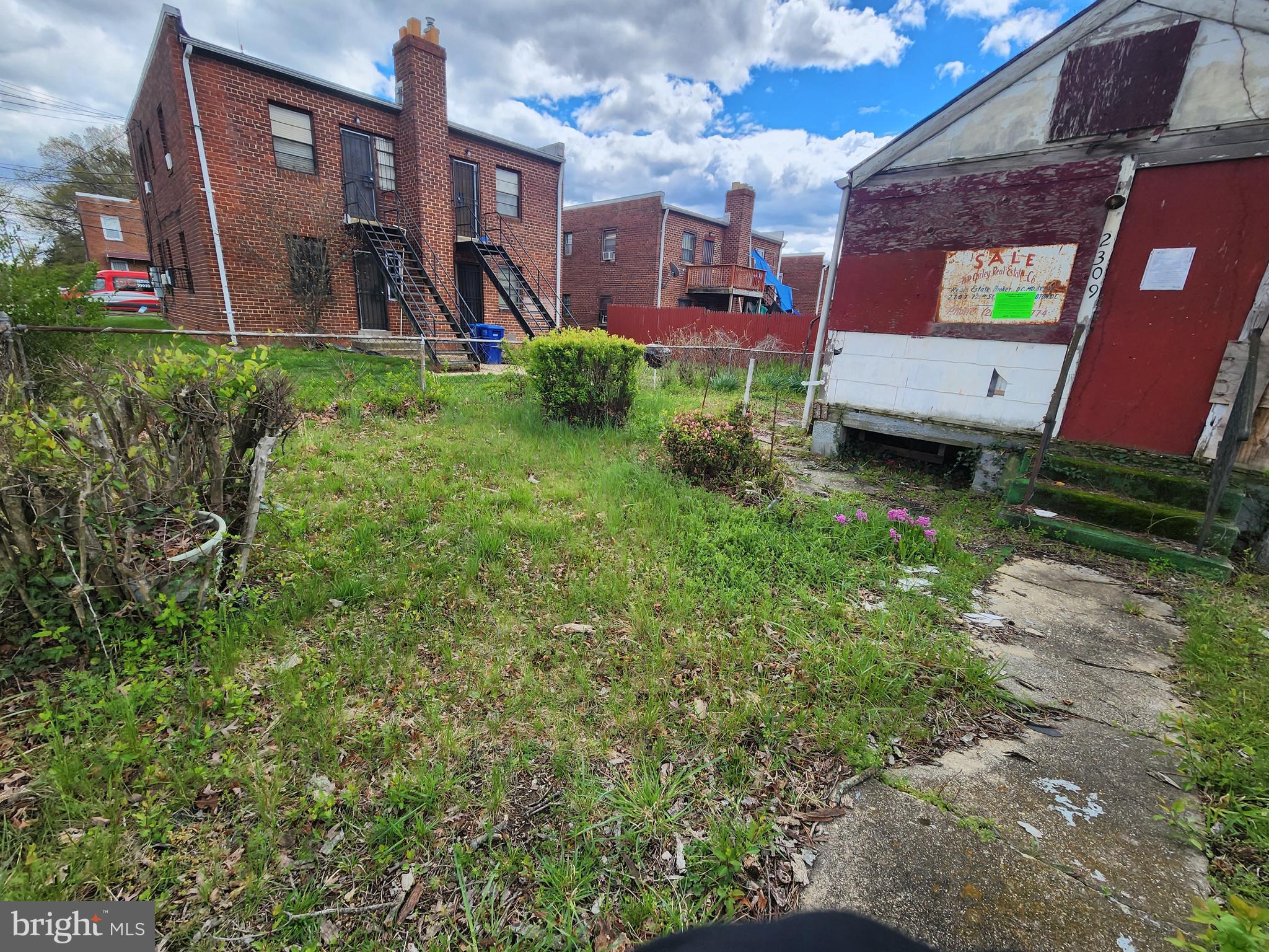 2309 Irving Street Southeast Washington, DC 20020 - Photo 3 of 4 a view of building with yard