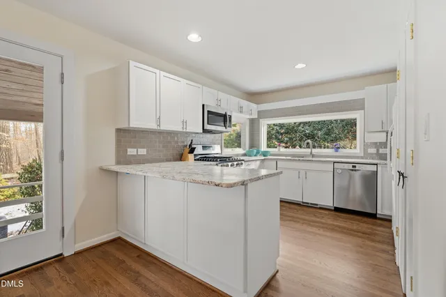 $725,000 | 5112 Huntingwood Drive, Raleigh, NC 27606