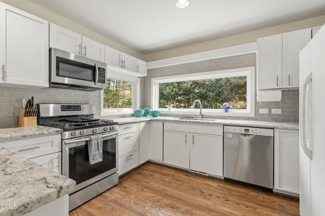 $725,000 | 5112 Huntingwood Drive, Raleigh, NC 27606