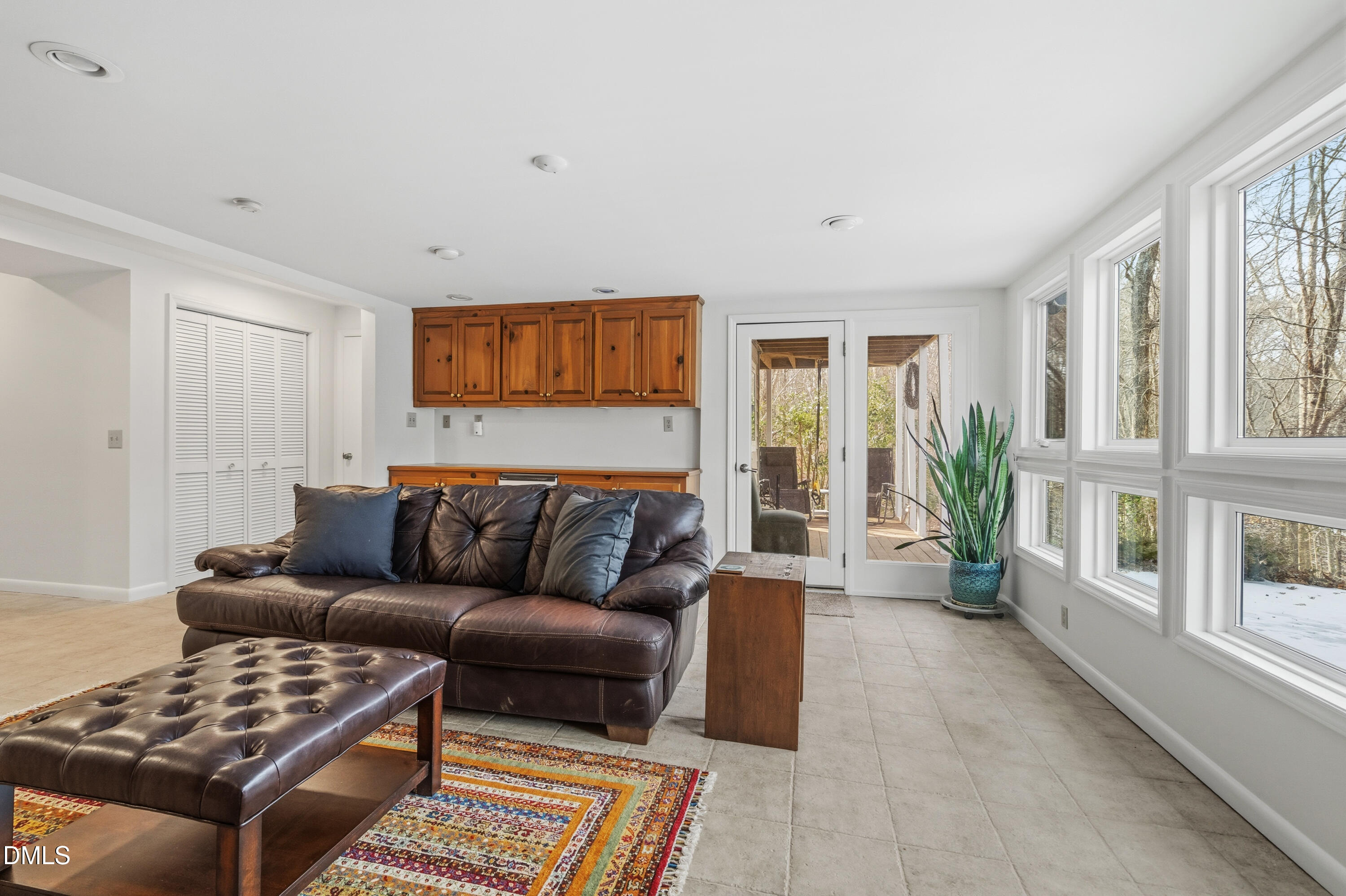 5112 Huntingwood Drive Raleigh, NC 27606 - Photo 39 of 47 Family Room with Porch Access