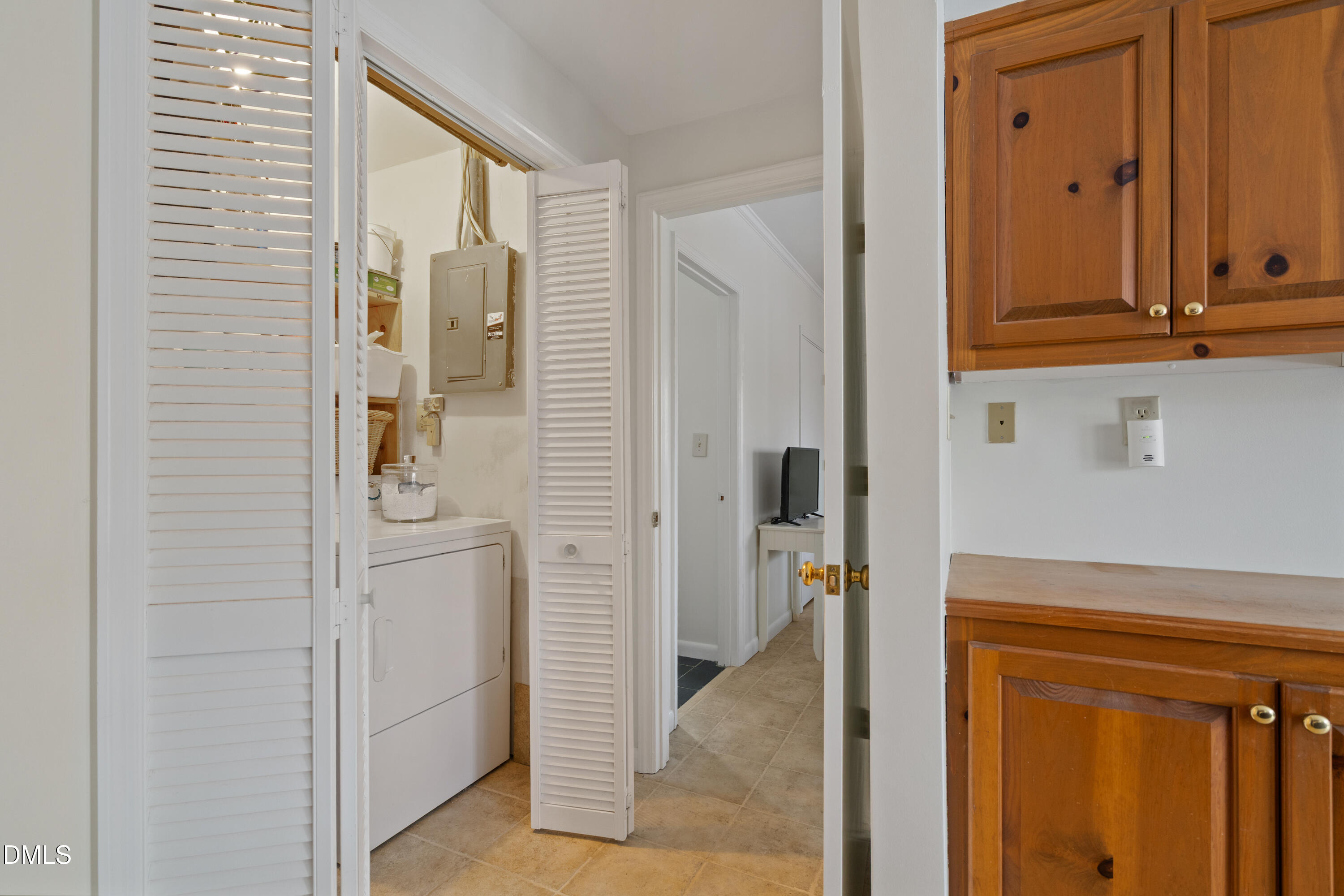 5112 Huntingwood Drive Raleigh, NC 27606 - Photo 40 of 47 Laundry Closet