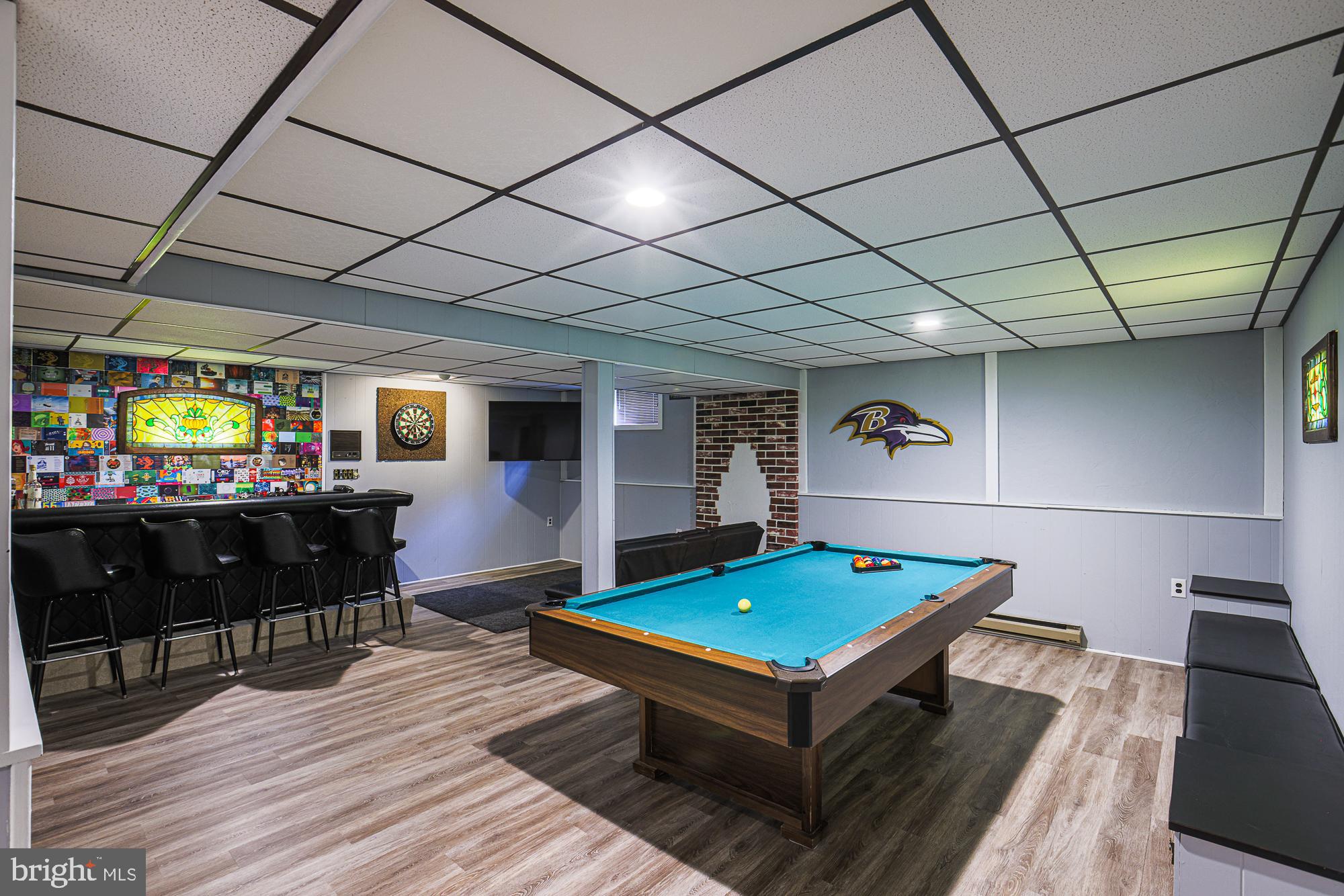 4402 Macworth Place Nottingham, MD 21236 - Photo 28 of 36 a living room with pool table flat screen tv and couches
