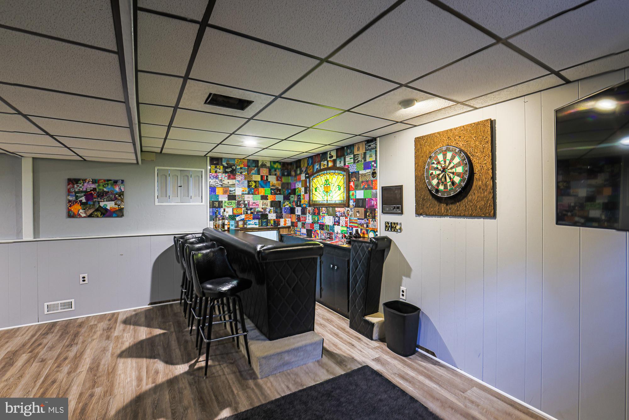 4402 Macworth Place Nottingham, MD 21236 - Photo 30 of 36 a room with lots of wooden furniture and a window